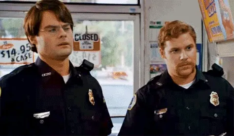 Superbad meme: two uniformed police officers standing in a convenience store, staring blankly