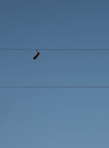 Shoes on a powerline outside Dilley Texas